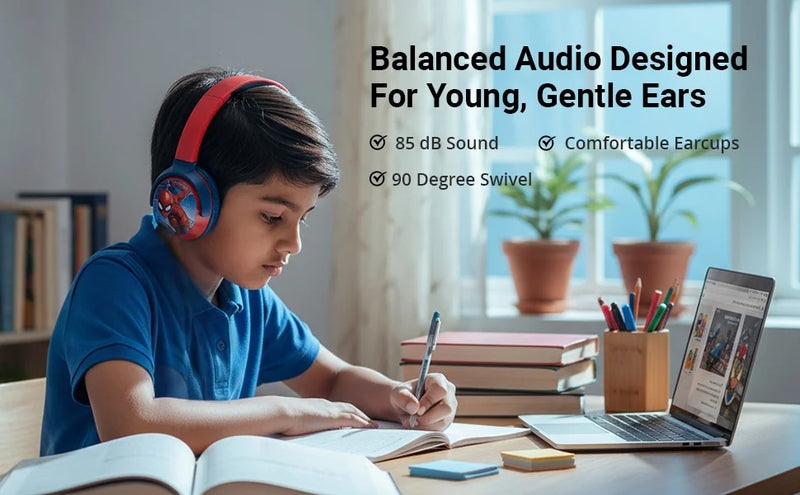 Boy using Marvel Spider-Man Bluetooth headphones with swivel cups for safe listening, 85 dB sound limit and comfortable earcups during study time