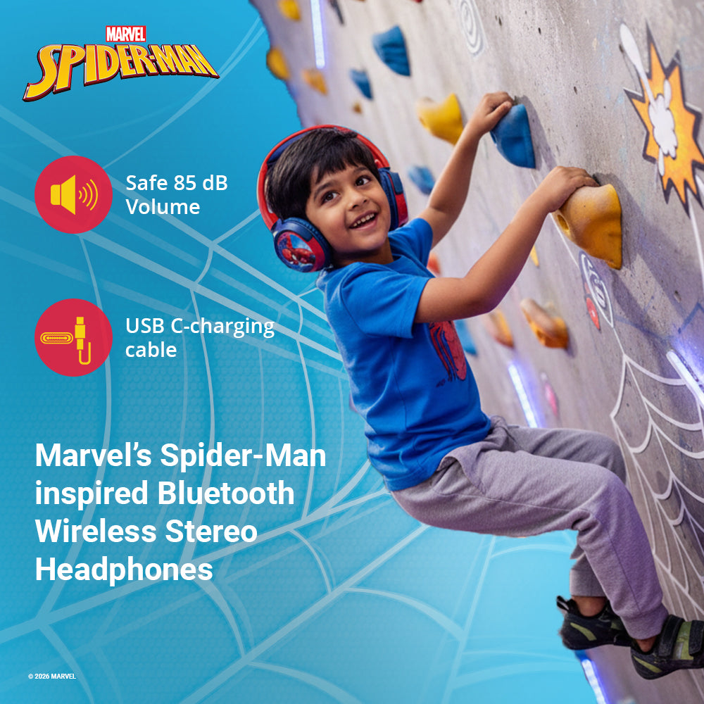 Child wearing MYANT Marvel Spider-Man Bluetooth wireless stereo headphones while climbing indoors, highlighting safe 85 dB volume and USB-C charging support.