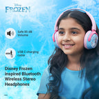 Child wearing Disney Frozen inspired Bluetooth wireless stereo headphones with safe 85 dB audio limit and USB-C charging compatibility.