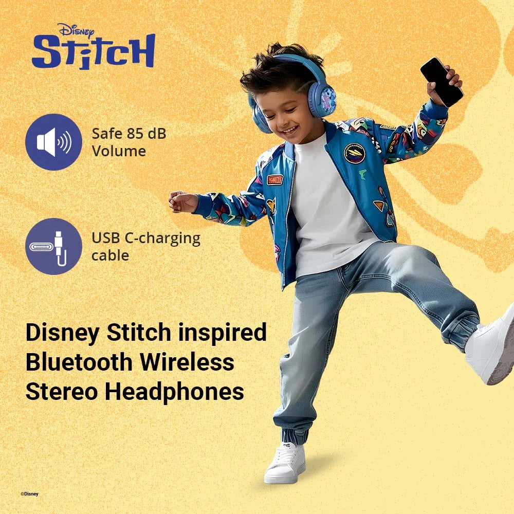 Boy wearing Disney Stitch Bluetooth headphones, holding phone, smiling, safe 85 dB volume, USB C charging